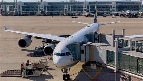 Lufthansa Airbus A340-300 parked at a Frankfurt Airport gate before departure