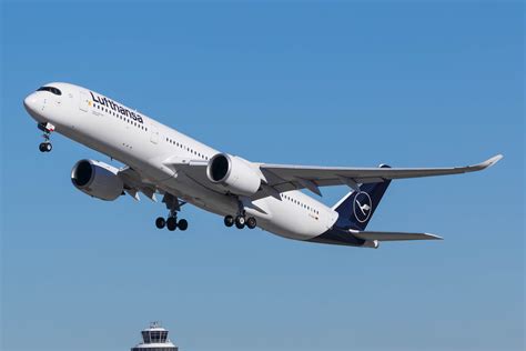 Lufthansa Airbus A350 taxiing at Frankfurt Airport terminal