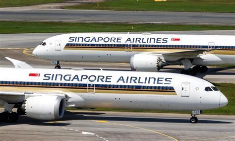 Lufthansa and Singapore Airlines planes at Frankfurt Airport