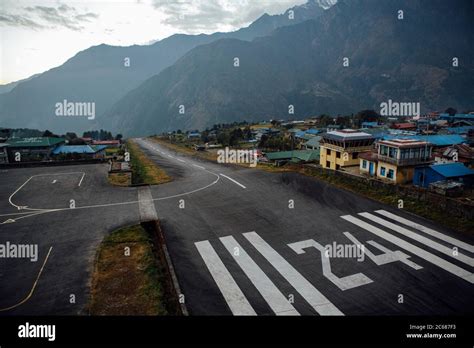 Lukla Airport sloped runway beneath Himalayan peaks