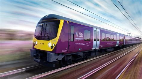 Luton Airport DART shuttle connecting to train station at sunset