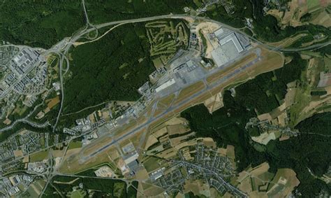 Luxembourg Airport terminal with aircraft on apron