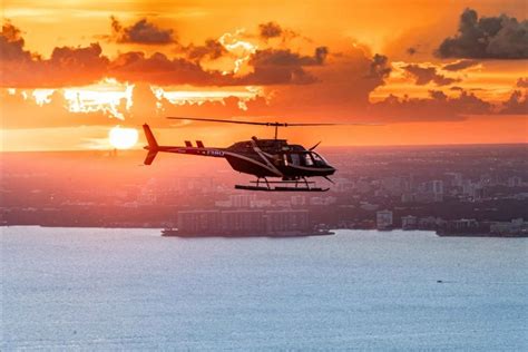 luxury helicopter taking off near Baltimore harbor