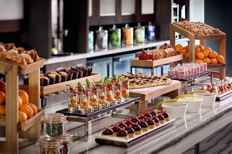 luxury hotel breakfast buffet Asia international cuisine sushi pastries hot dishes
