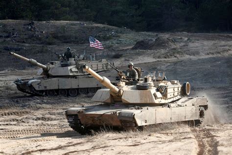 M1A2 Abrams tank integrated with mechanized infantry during NATO drill