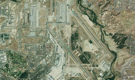 Madrid Barajas Airport terminal with Singapore Airlines destination display