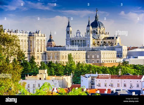 Madrid cityscape featuring the Royal Palace and Almudena Cathedral at sunset
