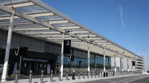 manchester airport night departure zone with norse atlantic signage