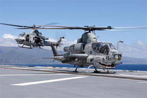 Marine AH-1Z Viper and UH-1Y Venom operating in a distributed Pacific island exercise