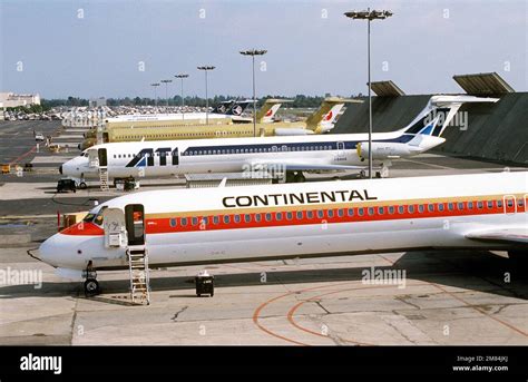 McDonnell Douglas DC-9 parked beside MD-90 at airport ramp