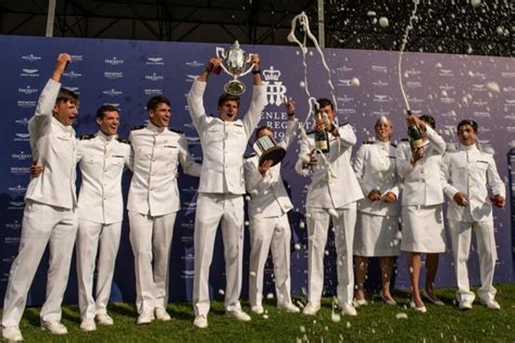 Mel Willies holding the King’s Cup trophy beside G-BTBW post-victory