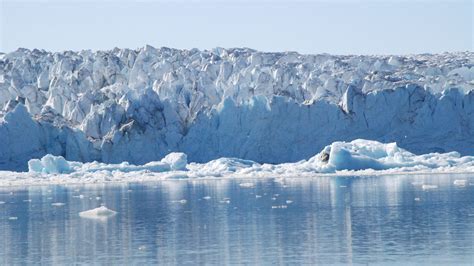melting glacier eco-tourism trek in Greenland with sustainability briefing