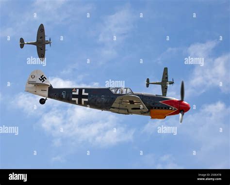 messerschmitt bf 109 dogfighting spitfire over channel skies