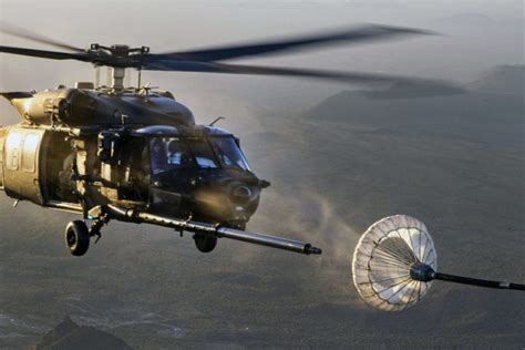 MH-60 Black Hawk helicopter involved in aerial refueling training operations