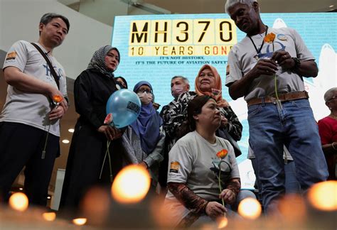 MH370 families holding vigil at Kuala Lumpur airport in candlelight