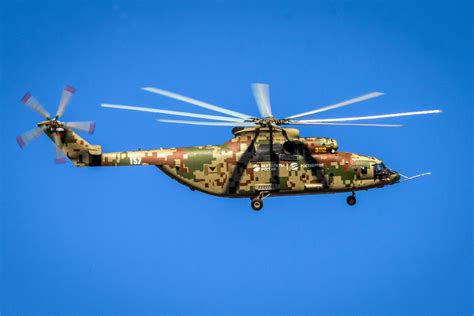 Mi-26T2V modern variant parked on snow-covered tarmac with updated radar dome