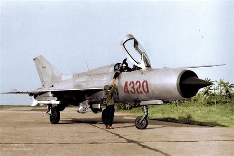 mig-21 interceptor jet parked on soviet-era airbase
