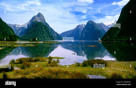 Milford Sound fjord with waterfalls and snow-capped peaks