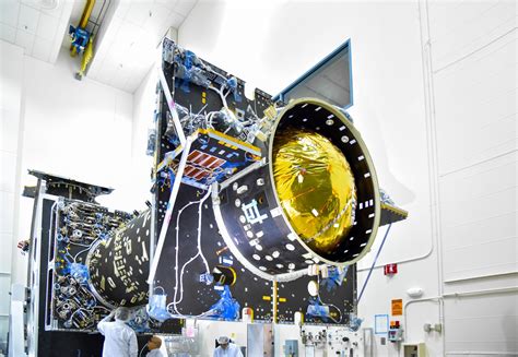 MIT aerospace lab with student working on propulsion module