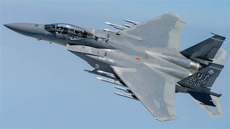 mixed formation of F-35 and F-15EX flying in coordinated combat exercise