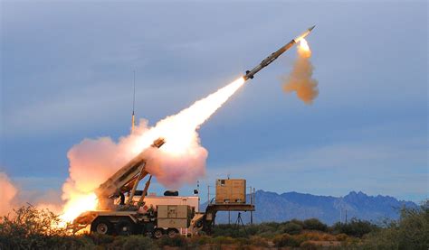 Mk-41 vertical launch system missile launch from naval warship