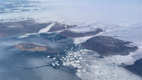modern aerial view of Greenland’s melting ice near Camp Century site