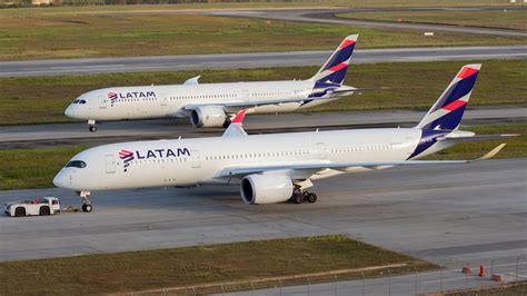 modern Airbus A350 and Boeing 787 at Melbourne Airport international terminal