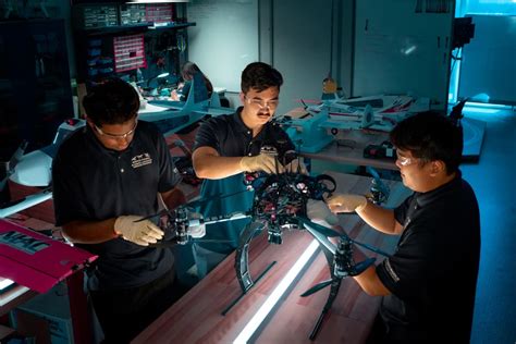 modern engineering lab at Embry–Riddle Aeronautical University with students developing drone technology