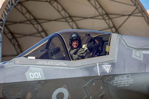 modern fighter pilot inside F-35 cockpit under missile threat