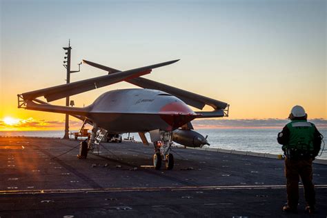 MQ-25 Stingray UAV preparing for refueling operations on a carrier deck
