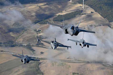 multinational F-35 operators during NATO air exercise with allied stealth fighters
