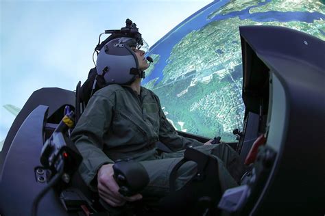 Multinational NATO pilots training together on F-35 simulators