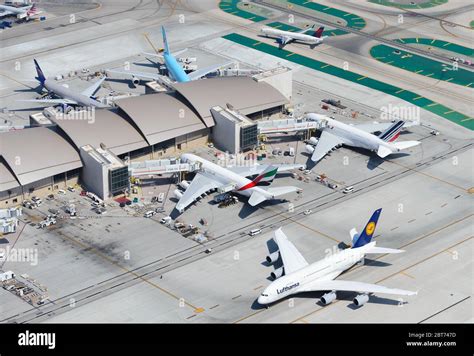 multiple Air France A380 aircraft parked at Paris CDG terminal gates