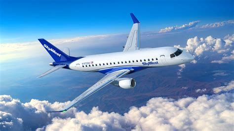 Multiple CRJ900s parked in maintenance configuration at SkyWest Airlines facility