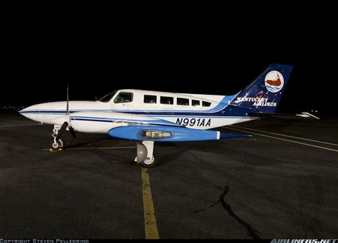Nantucket Airlines Cessna 402 loading passengers on a clear summer day