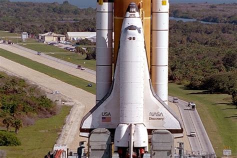 NASA F-18 escorting a space shuttle during re-entry observation