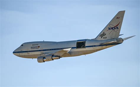 NASA SOFIA Boeing 747SP aircraft with telescope hatch open in flight