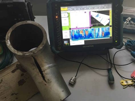ndt inspector inside wind turbine hub performing phased array ultrasonic testing