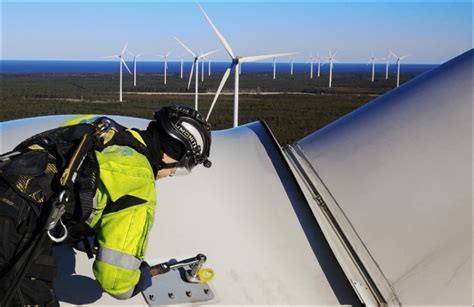 ndt technician inspecting turbine blade in high-stakes energy plant environment