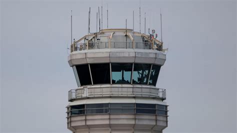 Newark airport air traffic control tower with congested runway traffic