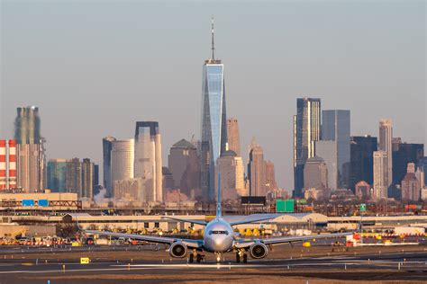 Newark Liberty International Airport at sunset, a symbol of strained infrastructure and urgent reform