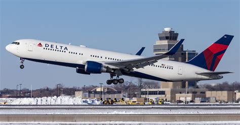 NFL team charter widebody aircraft at airport ramp