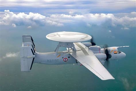 Northrop Grumman E-2D Hawkeye in flight with radar dome over ocean