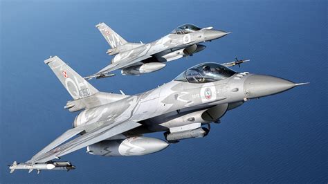 Norwegian F-35 jet in formation with Polish F-16 during NATO air policing drills