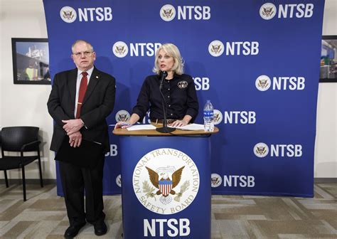 NTSB officials presenting investigation findings at a public hearing