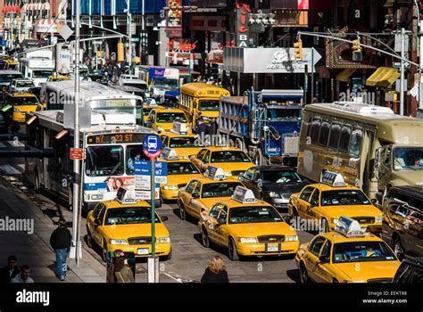 NYC yellow cab caught in Manhattan traffic during peak hour