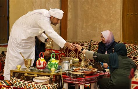 Oman Air Arabic coffee and dates served in business class