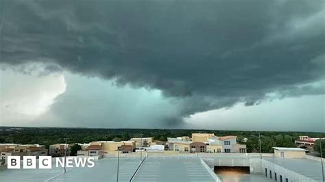 ominous storm clouds over airplanes at JFK as new weather alerts issued