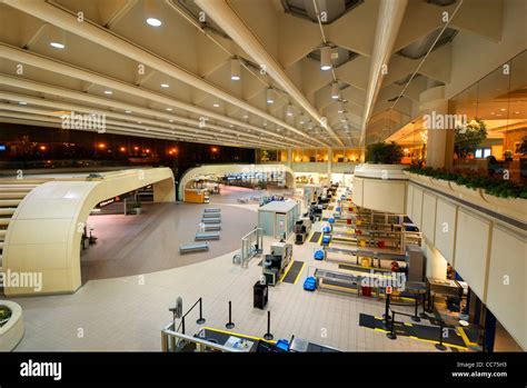 Orlando International Airport terminal interior with signage and passengers