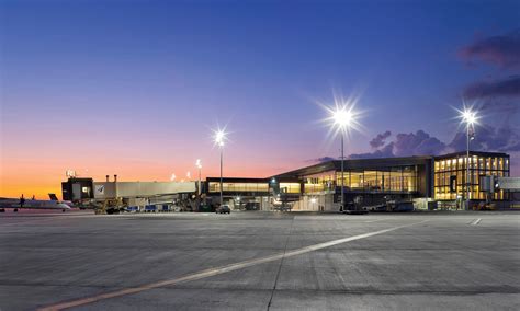 Ottawa Macdonald Cartier International Airport terminal runway modern skyline